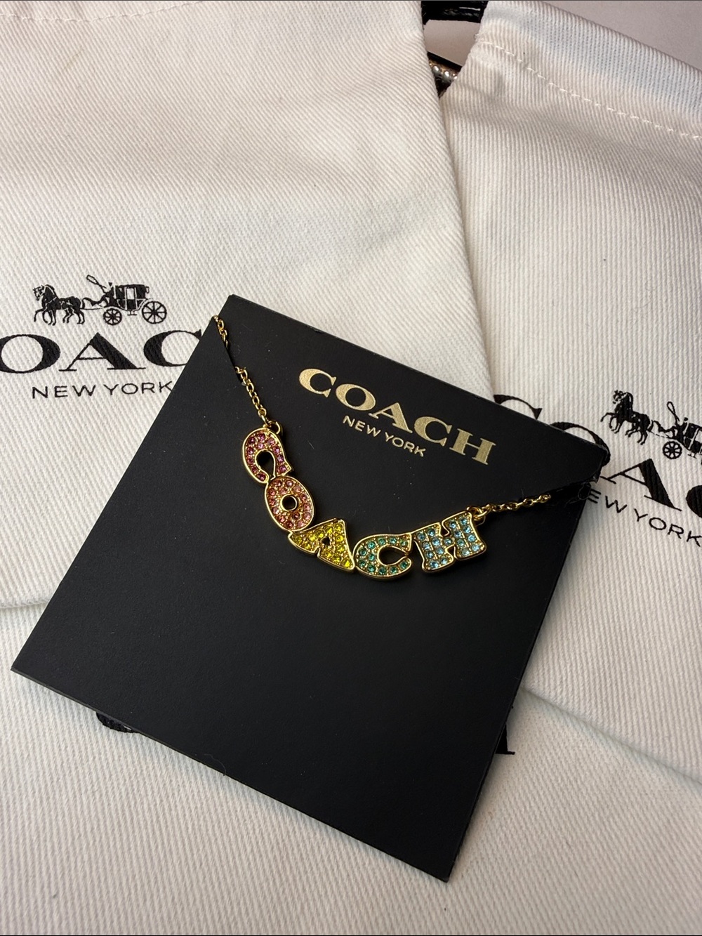 Coach Gold-Tone Logo Necklace with Pink, Yellow and Blue Crystals - Picture 2 of 3